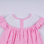 Pink character hand smocked dot ruffle dress